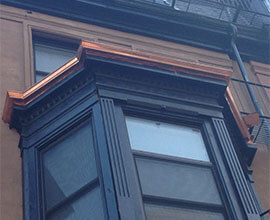 copper gutters front of the house